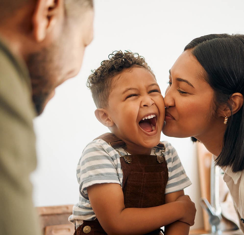 Happy child with parents