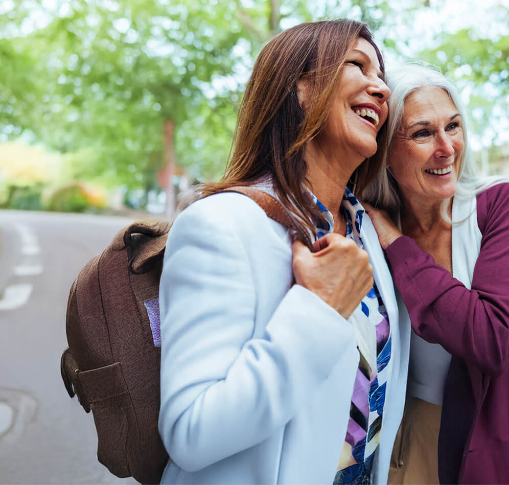 Two ladies smiling