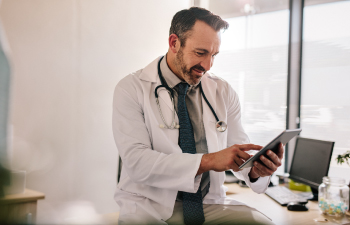 Image of doctor on a tablet